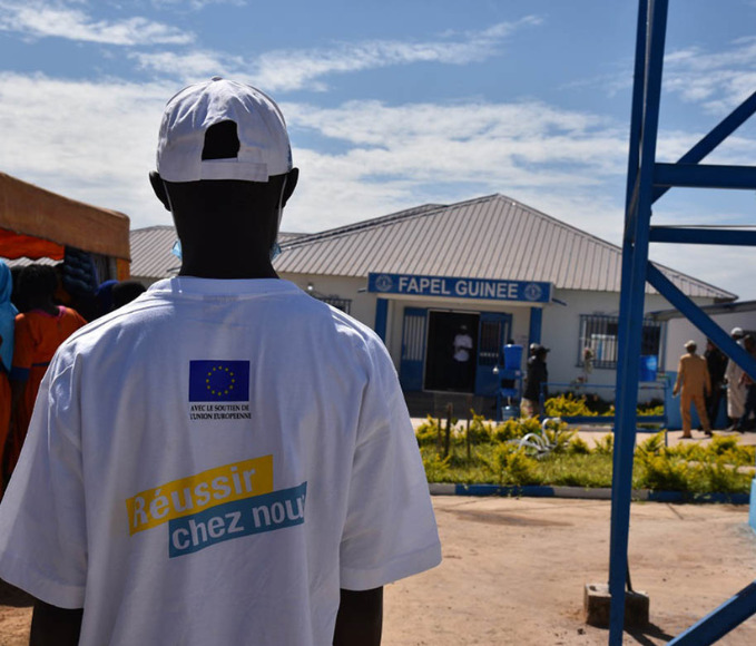 back of a man showing a European Union branded t-shirt