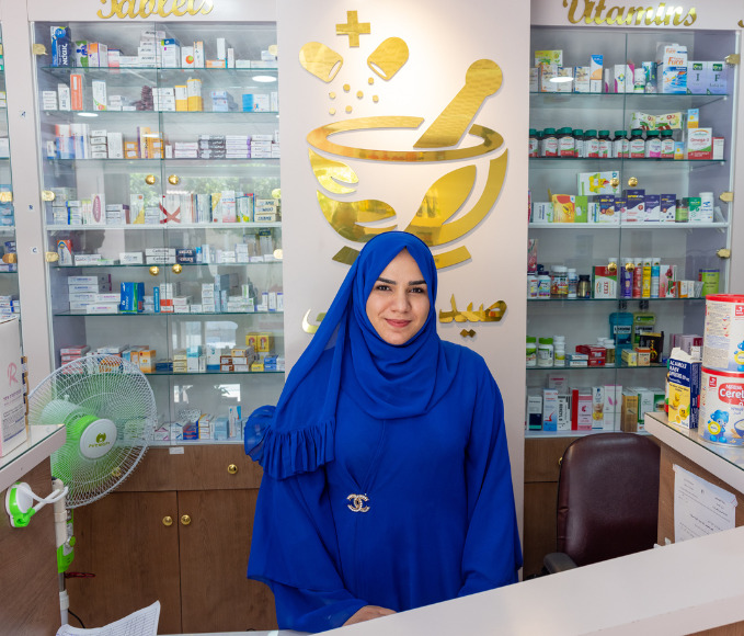 women entrepreneur in her pharmacy.
