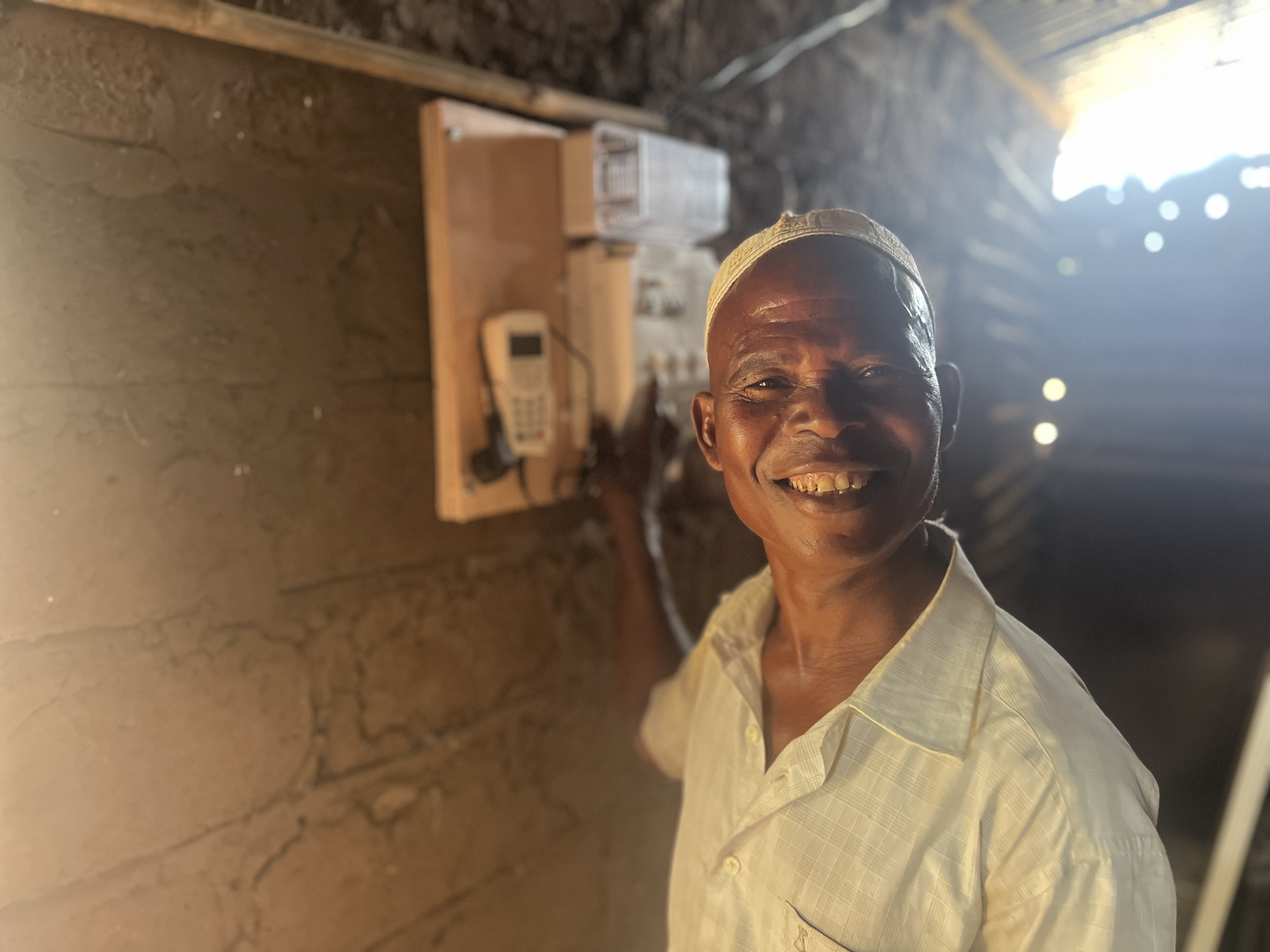 man standing next to electricity