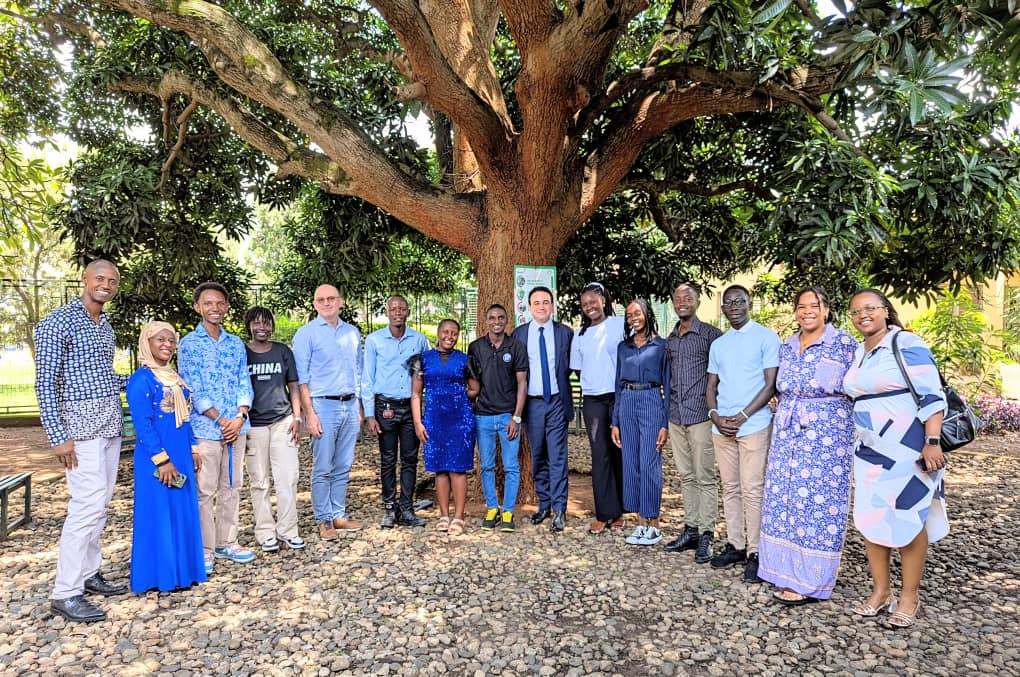 Group picture in front of a tree.
