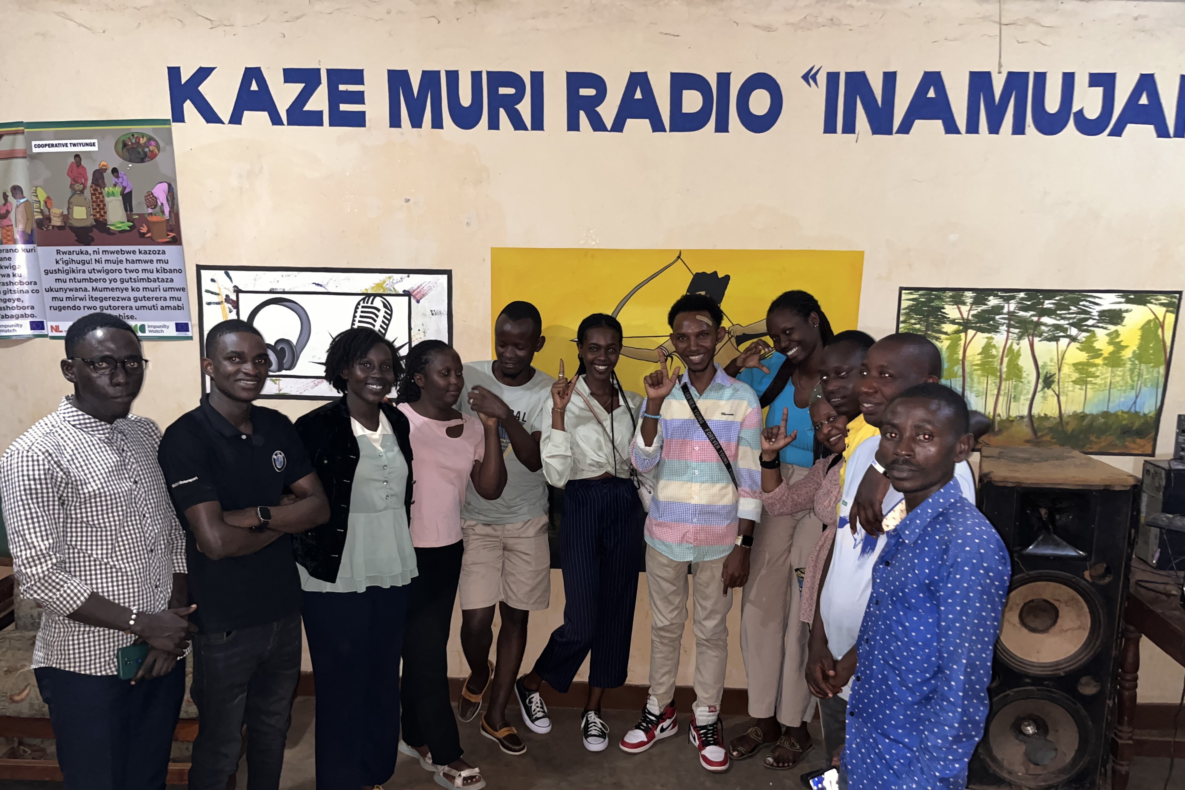 Picture of group of people visiting a radio station in Burundi.