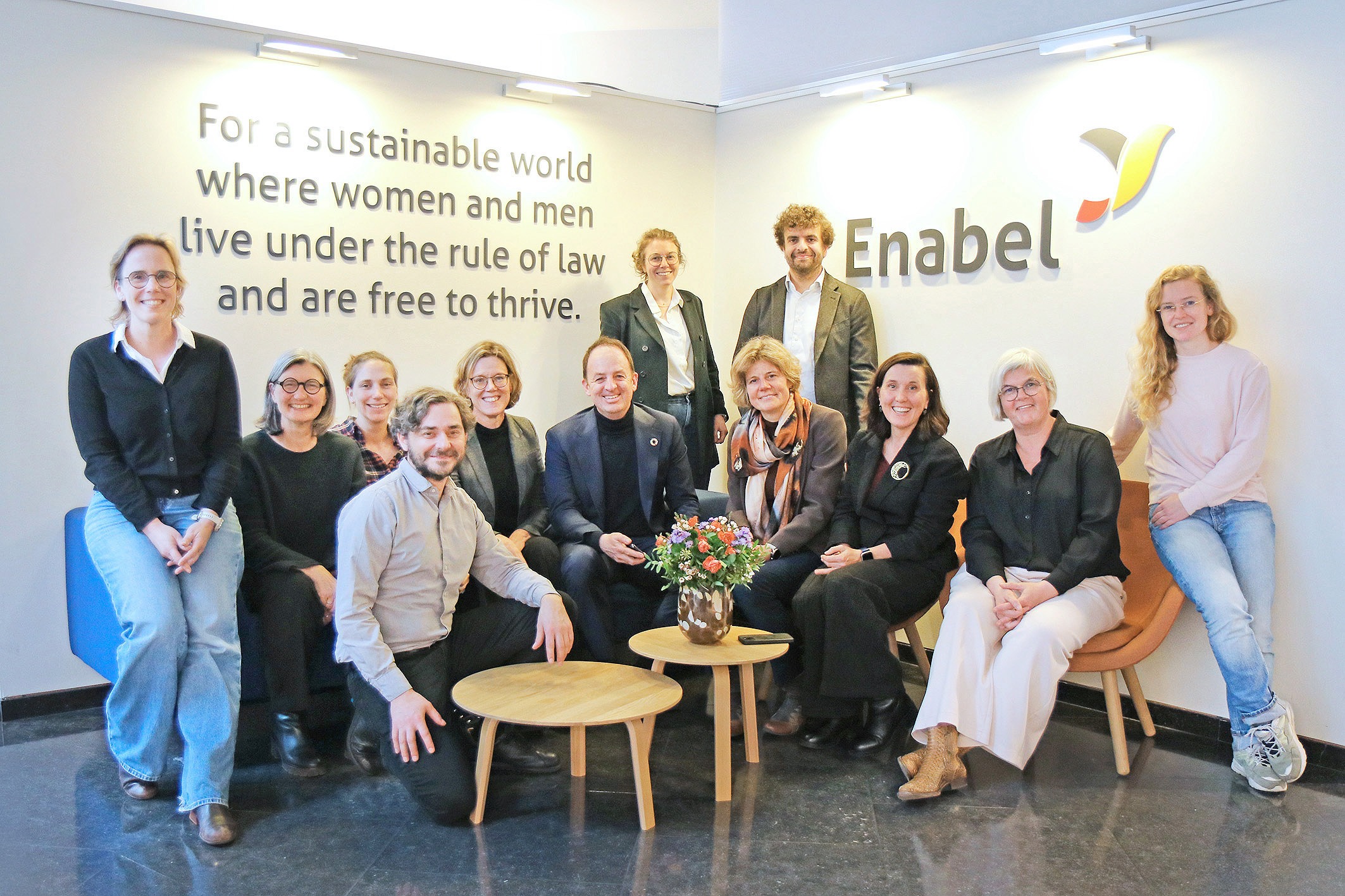 team enabel and VITO posing for a picture at enabel office