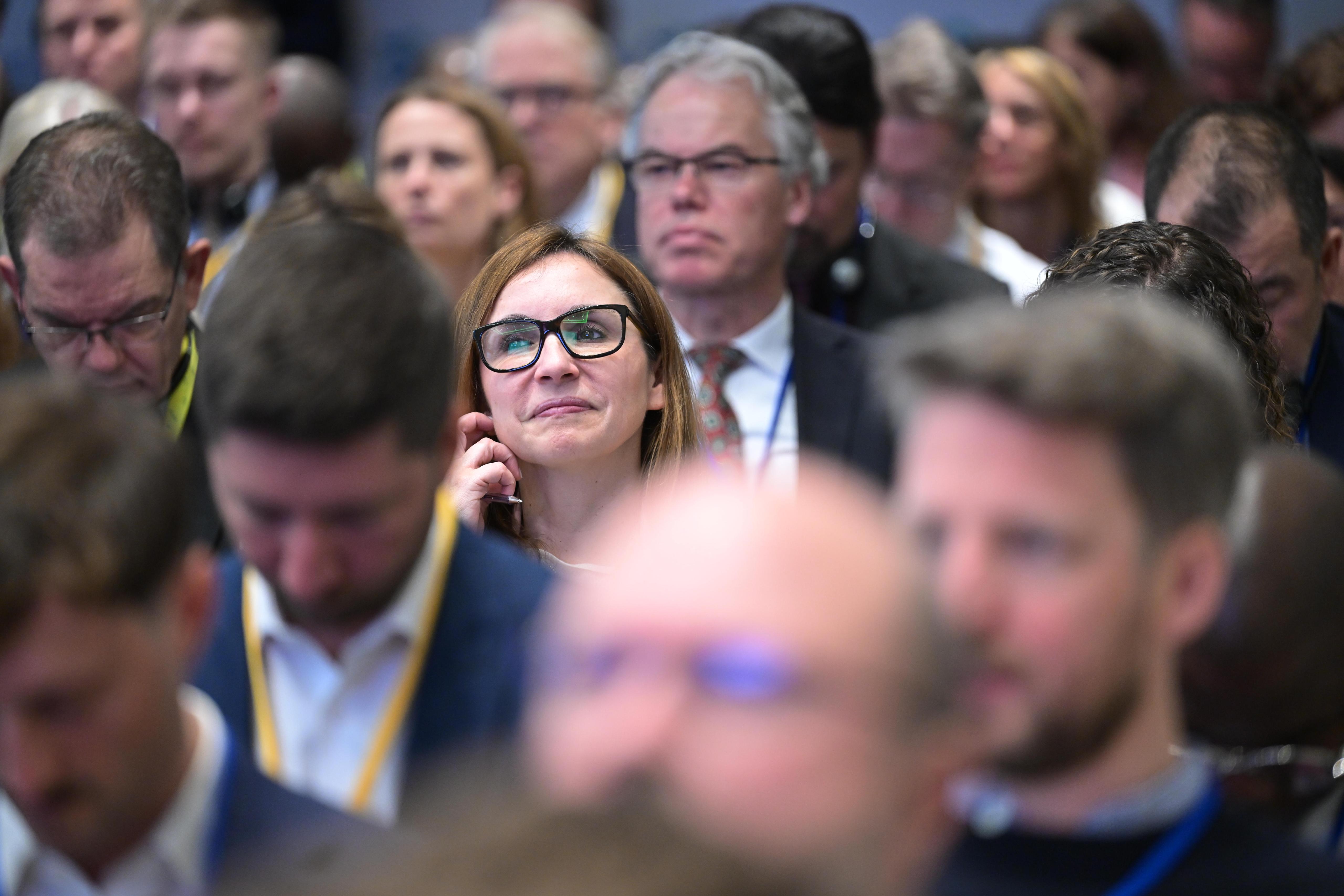 woman on the phone in a meeting room