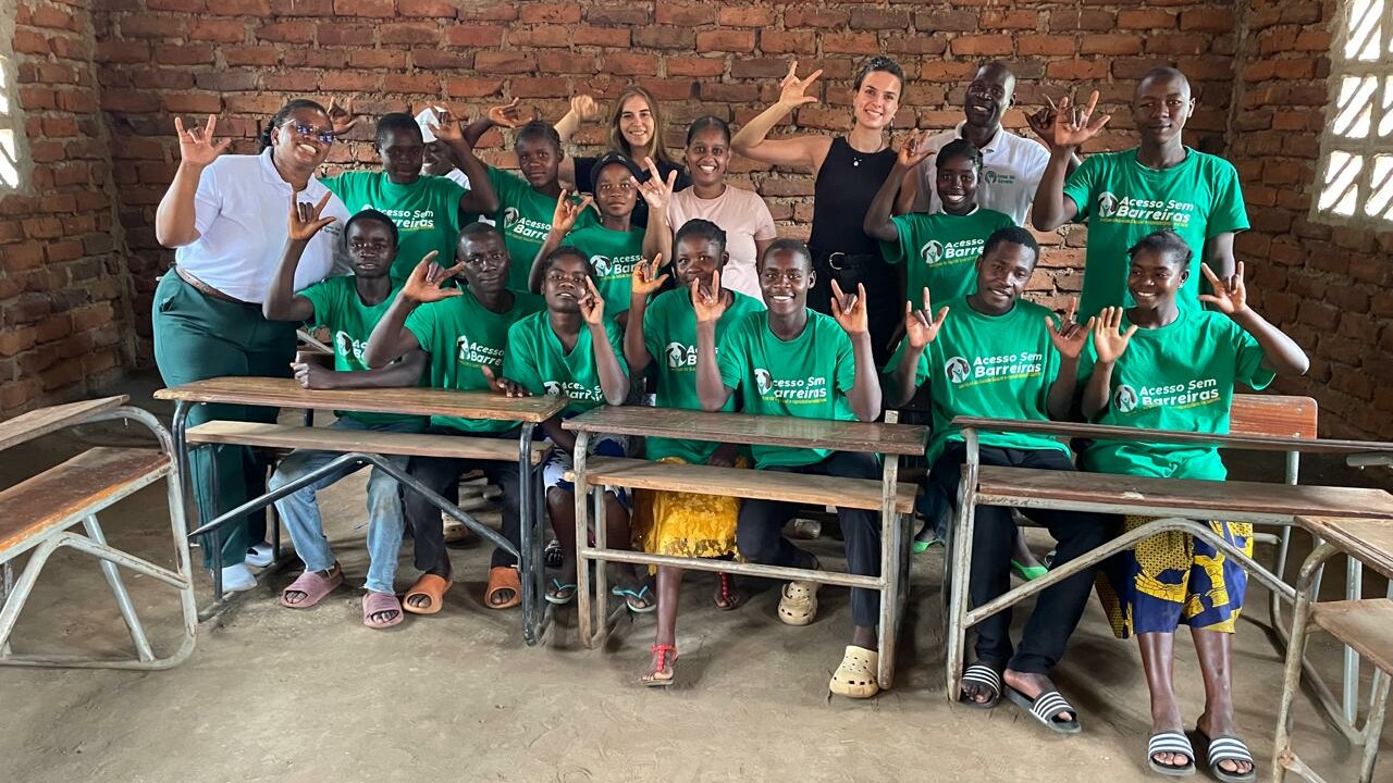 A Mozambican youth group poses for a picture.