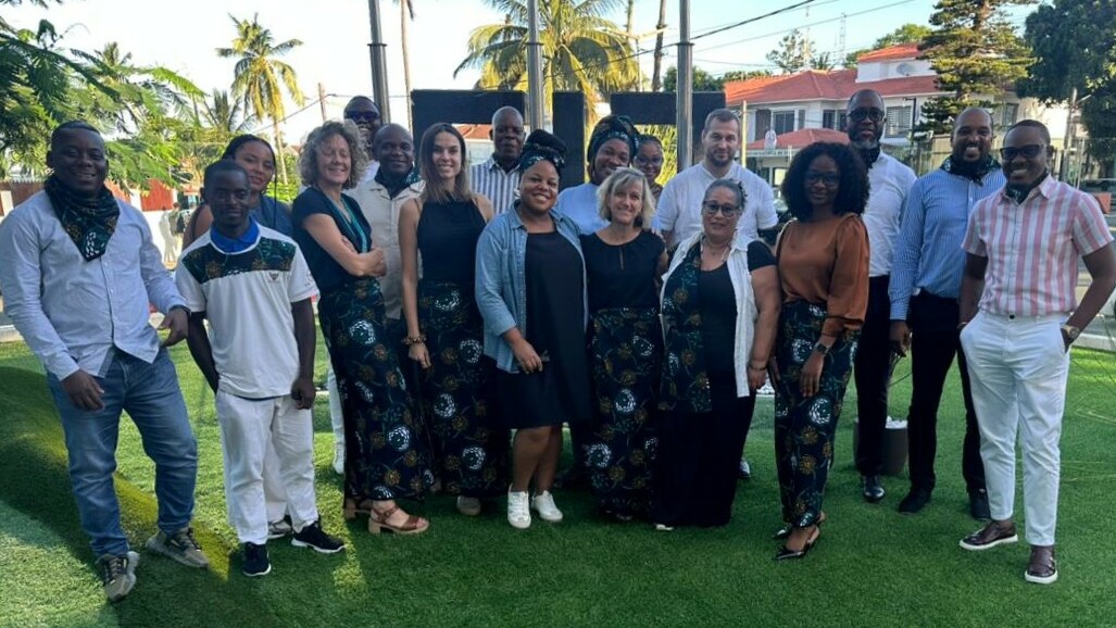 group pictures, 15 colleagues posing for a picture.