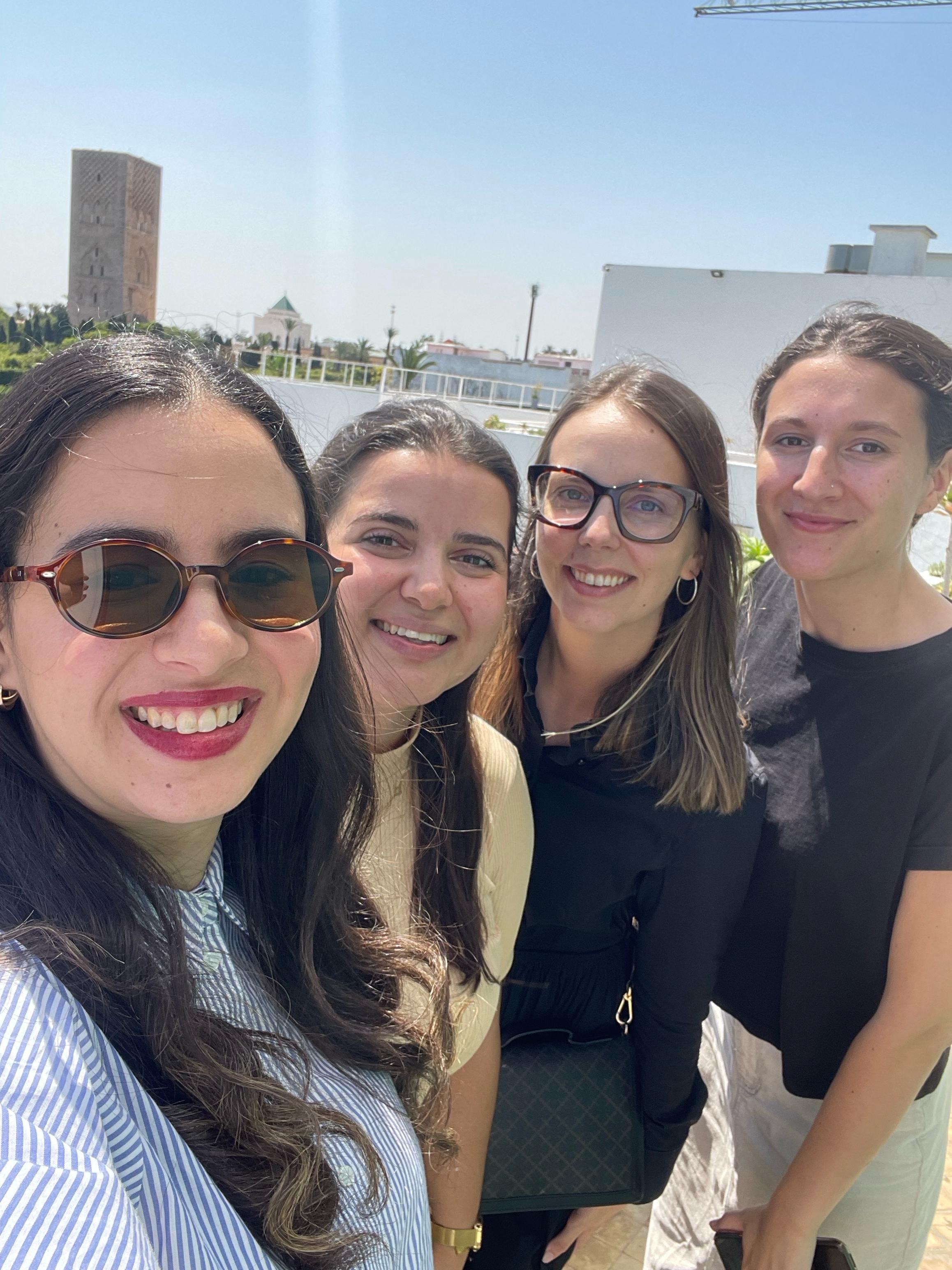 4 junior experts in Morocco pose for a picture and smile.