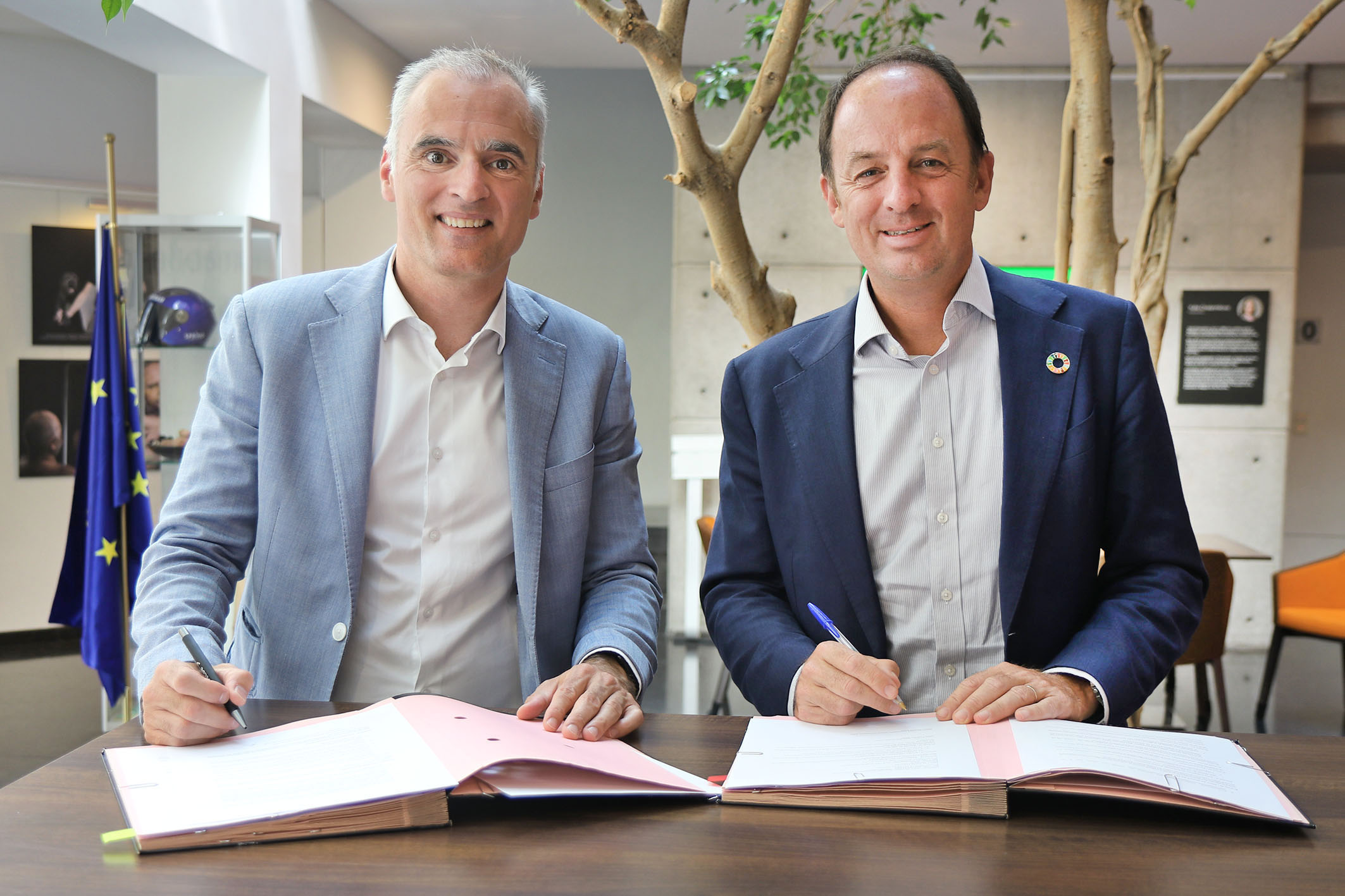 CEOs of Enabel and Rombouts coffee taking the pose