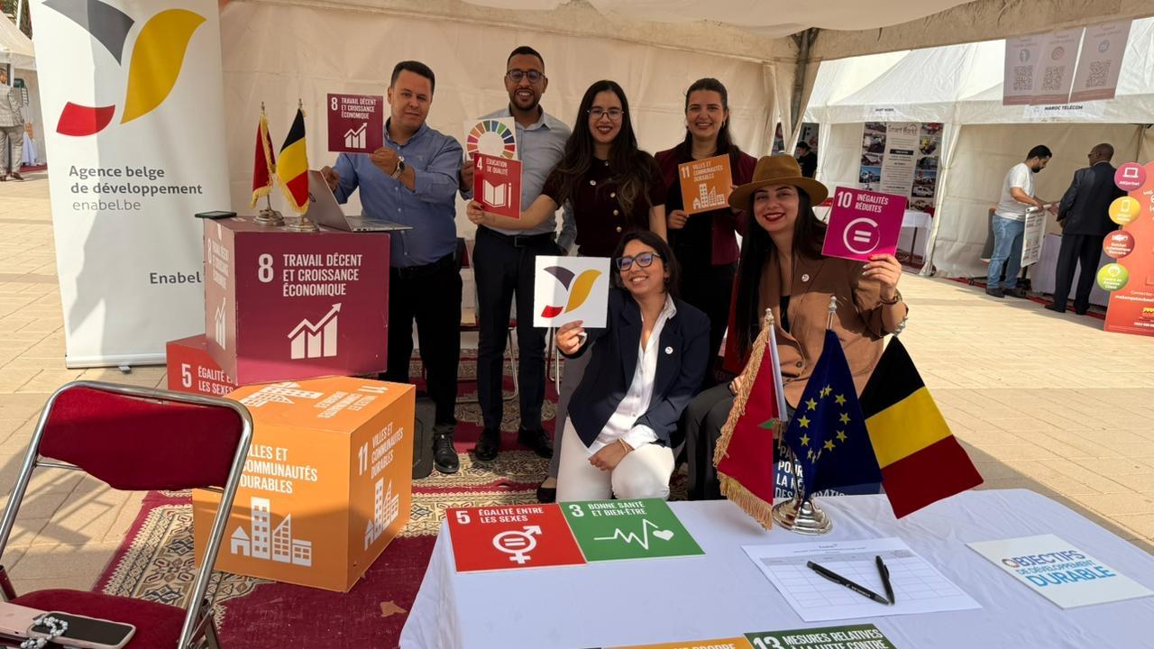 Enabel colleagues working in Morocco pose at and event about the sustainable development goals